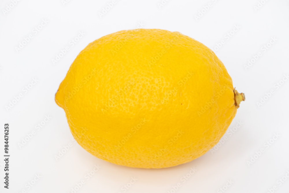 Vibrant Whole Lemon on Minimal White Background Vibrant Whole Lemon on Minimal White Background