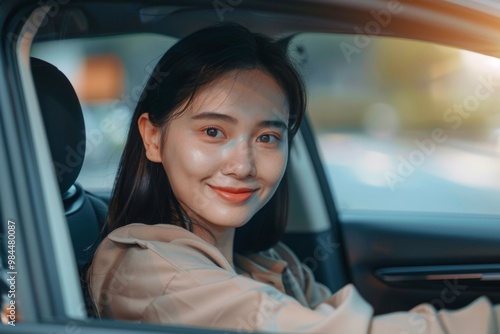 A beautiful girl driving a car, radiating confidence and style, against the background of a city street or a picturesque landscape