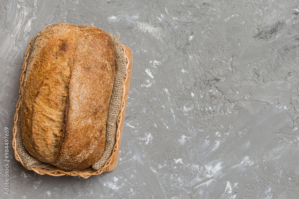 Freshly baked bread on basket against natural background. top view bread copy space Freshly baked bread on basket against natural background. top view bread copy space
