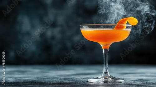 Elegant Orange Cocktail with Smoke and Citrus Garnish