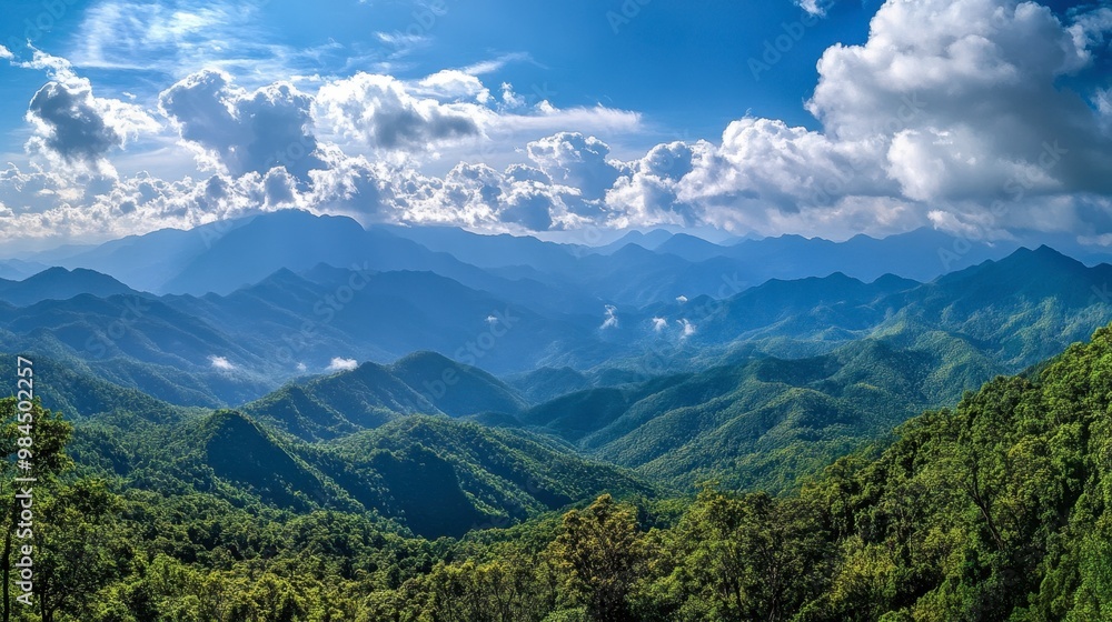 A panoramic view from the highest peak in Ackmon National Park, showcasing the expansive mountain ranges and dense forests. A panoramic view from the highest peak in Ackmon National Park, showcasing the expansive mountain ranges and dense forests.