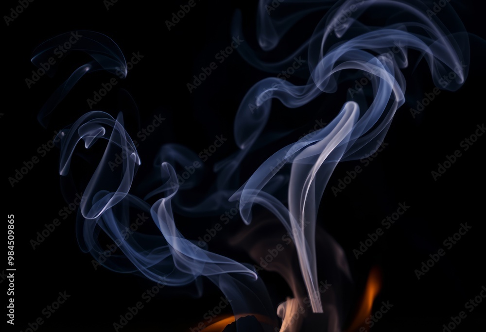 Wispy smoke This smoke rises in thin wispy tendrils from the fir Wispy smoke This smoke rises in thin wispy tendrils from the fir