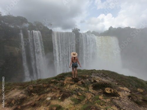 mulher no salto utiariti, em campo novo do parecis, mato grosso  photo