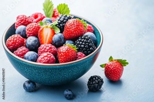 Fresh Mixed Berries in Colorful Bowl