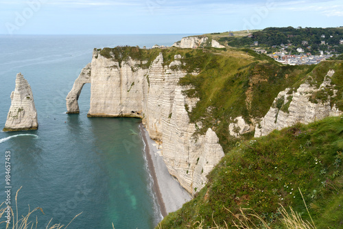 surrounded by the impressive cliffs above and below, Etretat Beach is undoubtedly one of Normandy's most beautiful beaches on the English Channel. photo