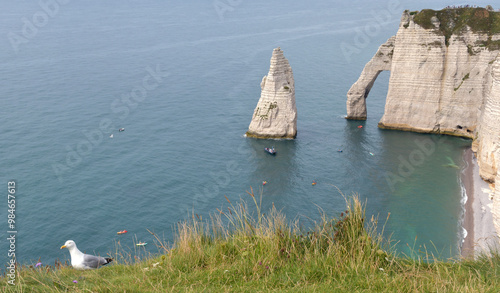 surrounded by the impressive cliffs above and below, Etretat Beach is undoubtedly one of Normandy's most beautiful beaches on the English Channel. photo