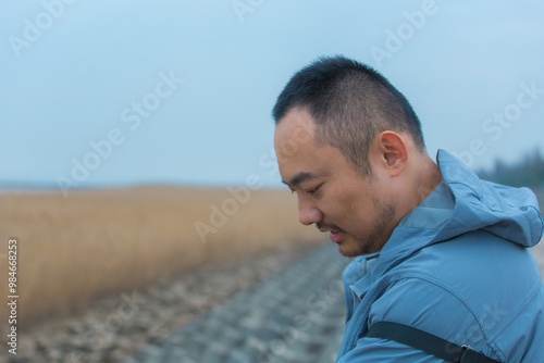 Chongming District, Shanghai - Young people on the beach under the blue sky
