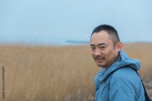 Chongming District, Shanghai - Young people on the beach under the blue sky