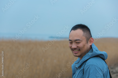 Chongming District, Shanghai - Young people on the beach under the blue sky