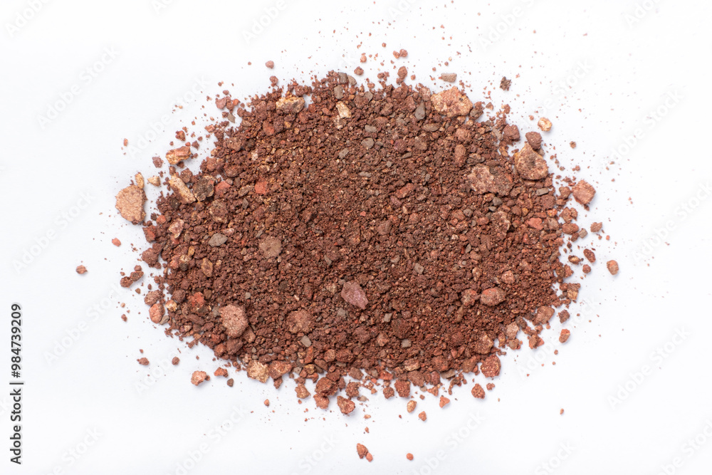 A mixture of different shades of eyeshadow on a white background. A mixture of different shades of eyeshadow on a white background.