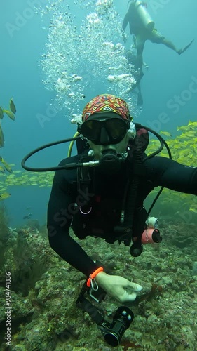 A diver during a shipwreck dive. Active vacation in the Maldives. 