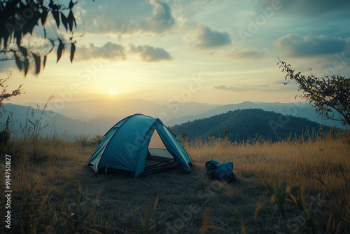 Selective focus camping tent in the forest with sunset view, Gray camping tent on the mountain at dusk. 