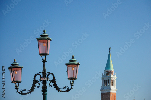 Vintage street lamp with San Giorgio Maggiore bell tower, Venice, Italy photo