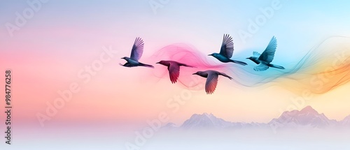 Colorful birds flying across a serene landscape, blending into a dreamy sky of pastel hues and misty mountains. photo