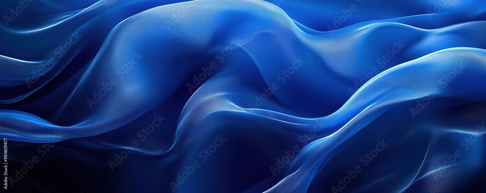 A mesmerizing abstract pattern featuring flowing blue waves, perfect for backgrounds, design projects, and artistic expressions. A mesmerizing abstract pattern featuring flowing blue waves, perfect for backgrounds, design projects, and artistic expressions.