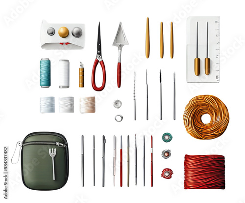 An organized assortment of crafting tools, including scissors, threads, and needles, arranged neatly on a black background. photo