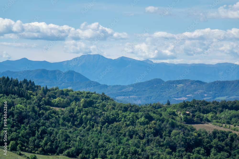 italian mountain landscape with trees and clouds italian mountain landscape with trees and clouds