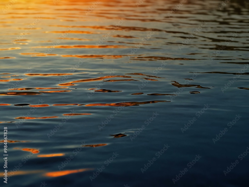 Rippling water reflecting sunset colors. Rippling water reflecting sunset colors.
