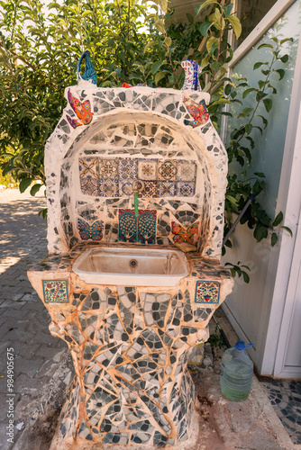 Colorful Mosaic Fountain with Intricate Tile Designs Outdoors