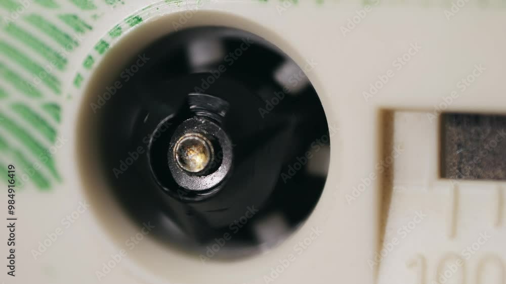 Retro radio tape recorder, audio cassette close-up. Listening to music, old radio boom box player, macro of vintage music listening. Retro radio tape recorder, audio cassette close-up. Listening to music, old radio boom box player, macro of vintage music listening.