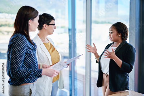 Collaboration, teamwork and women with paperwork, office and explaining to people, lobbyist and professional. Business, talking and employees with documents, planning and communication in meeting