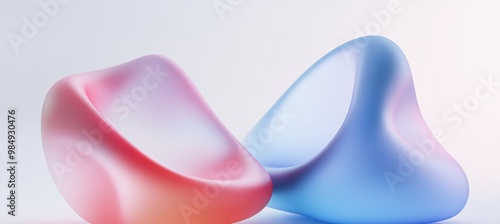 Two smooth, flowing sculptures in vibrant shades of pink and blue interact with light in an aesthetically pleasing art display