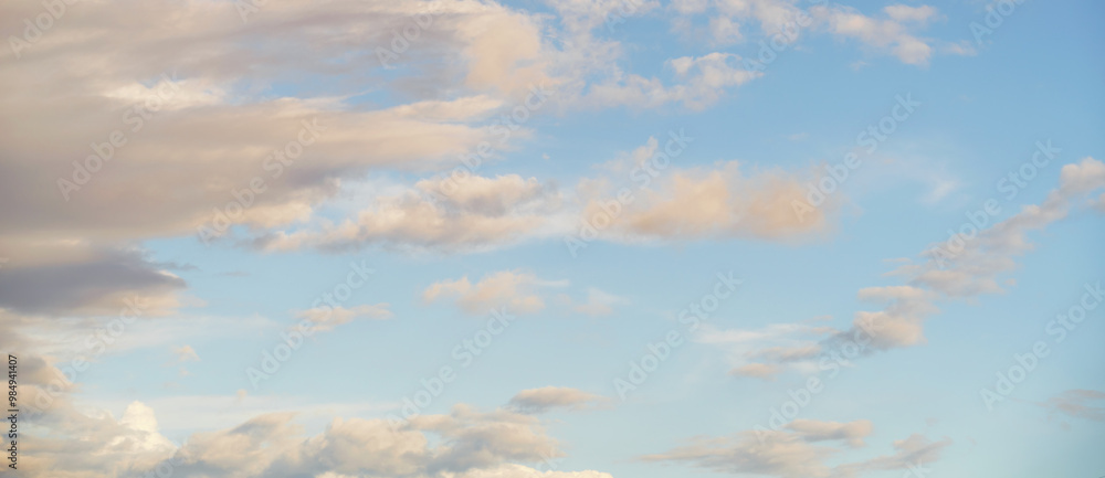 Pastel colored idyllic cloudy sky for texture and background