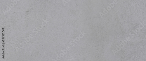 Textura de pared lisa y homogénea en tonos grises claros, superficie uniforme