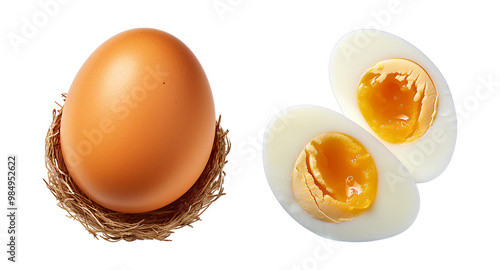 Eggs, both whole and peeled, present a nutritious and delicious contrast. A single brown egg rests in a cozy nest, while its perfectly cooked counterpart reveals a vibrant yellow yolk photo