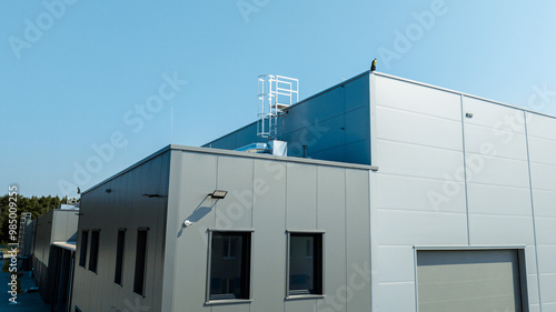 Basic Minimal Shape Abstract Exterior Warehouse or Construction Element Concept, Blue Sky in Background with Copy Space	