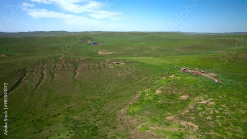 4K real shot of thousands of miles of grassland under the blue sky in the north photo