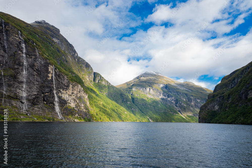 view of the beautiful waterfall seven sisters geiranger fjord in norway with mountains rocks and view of the beautiful waterfall seven sisters geiranger fjord in norway with mountains rocks and