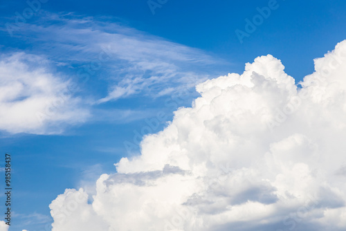Sticker large cumuli cloud and cirrus clouds in blue sky