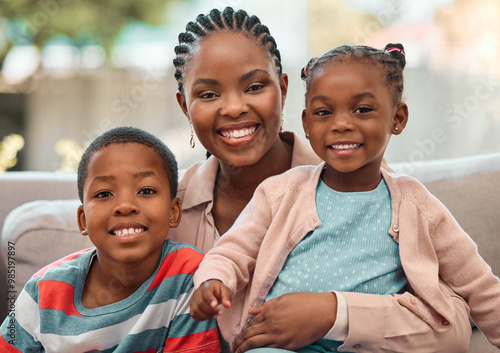 Portrait, happy black family and mother with kids on sofa at home for love, care or people relax. Smile, face or African children with mom for hug, trust or support with single parent or babysitter