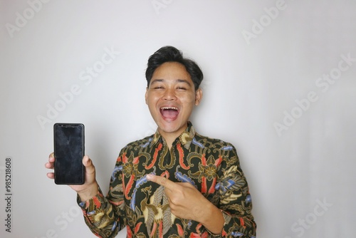 Handsome Indonesian man wearing batik with various expressions isolated white background