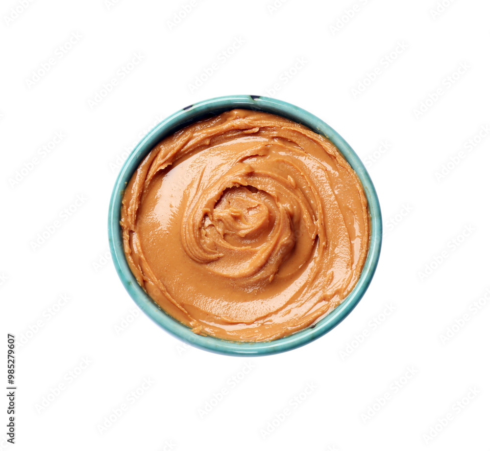 Tasty peanut butter in bowl isolated on white, top view Tasty peanut butter in bowl isolated on white, top view
