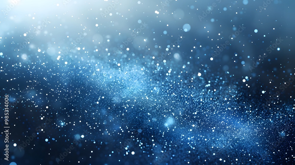 Obraz premium Blue metallic dust creates a sparkling background