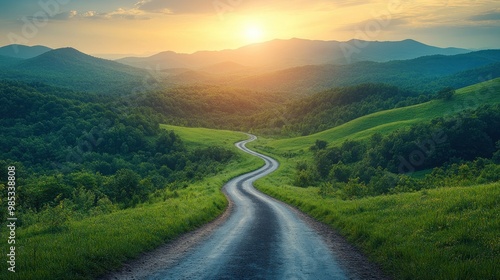 Winding Road Through Green Mountains at Sunset