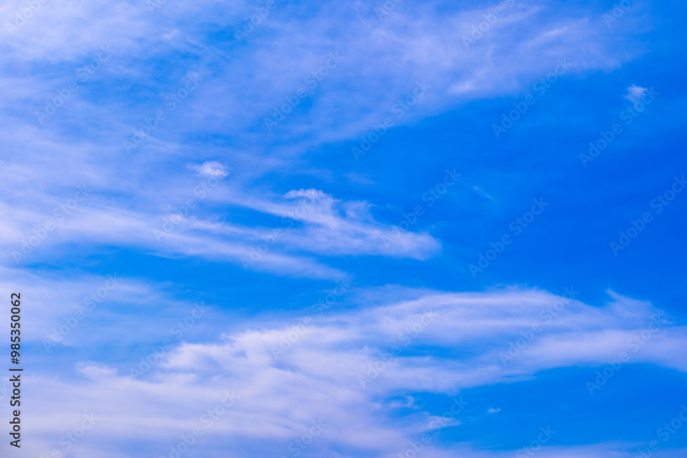 Obraz premium Panorama of cloud clear sky background for summer vacation concept at ocean and summer sea water with sunlight of beautiful cloudy sky