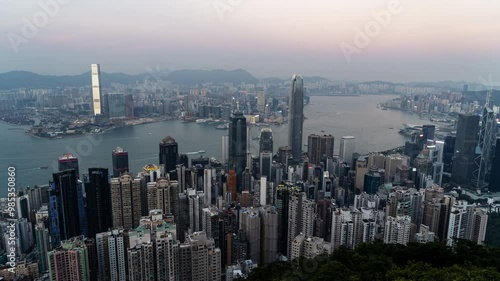 Wallpaper Mural HONG KONG, CHINA - November 26, 2023: Hong Kong, China, Time lapse view of famous Hong Kong skyline and Victoria Harbour at high mountian. Timelapse Cityscape Hong Kong. Footage b roll. Torontodigital.ca