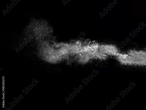 White Powder Explosion Against Black Background