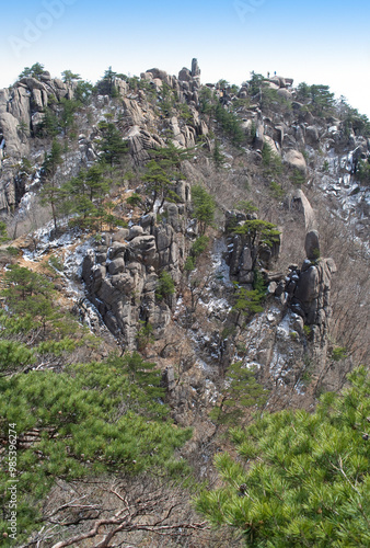 Snow covered Manmulsang Rocks with pine trees at Gayasan Mountain near Hapcheon-gun, South Korea photo