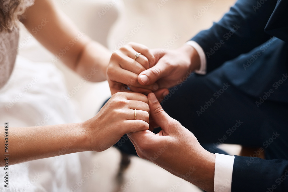 Couple, bride and groom holding hands for marriage, commitment and wedding ceremony together. Connection, rings and closeup of man and woman with love and romance celebration for partnership. Couple, bride and groom holding hands for marriage, commitment and wedding ceremony together. Connection, rings and closeup of man and woman with love and romance celebration for partnership.