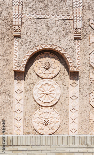 Carved stone pattern of the traditional wall decoration of an Arab building