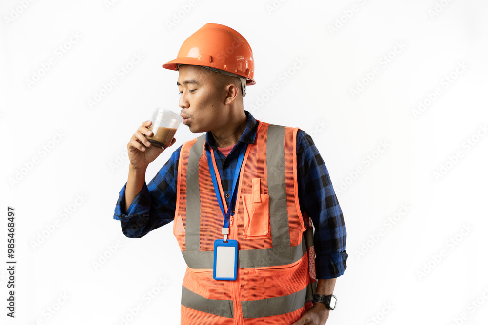 happy-faced mining worker contractor drinking coffee isolated white happy-faced mining worker contractor drinking coffee isolated white