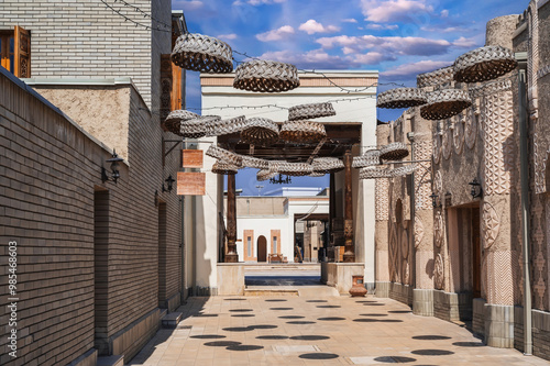 Photography An old narrow street of an ancient Arab city in Uzbekistan.