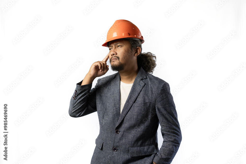 optimistic mens expressions and gestures thinking. stylish asian man with suit and orange helmet on white background. construction or mining business concept photo optimistic mens expressions and gestures thinking. stylish asian man with suit and orange helmet on white background. construction or mining business concept photo