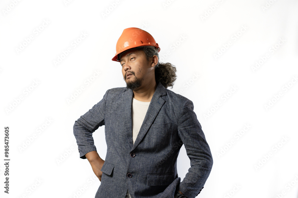 project leaders who look tired and pessimistic. stylish asian man with orange suit and helmet on white background. construction or mining business concept photo project leaders who look tired and pessimistic. stylish asian man with orange suit and helmet on white background. construction or mining business concept photo