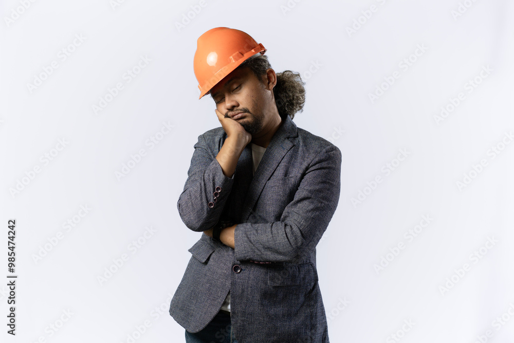 project leaders who look tired and pessimistic. stylish asian man with orange suit and helmet on white background. construction or mining business concept photo project leaders who look tired and pessimistic. stylish asian man with orange suit and helmet on white background. construction or mining business concept photo
