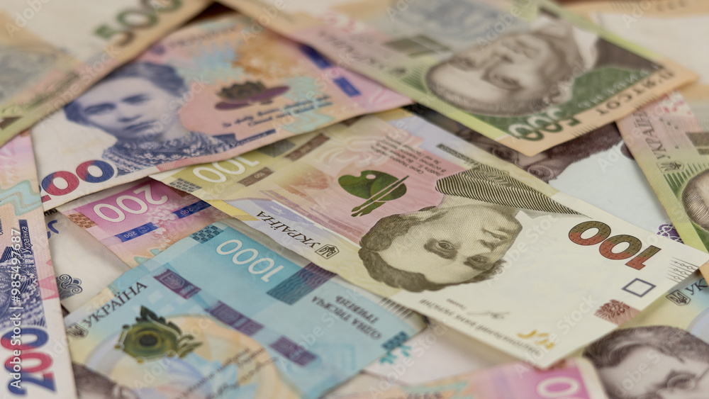 Ukrainian Hryvnia Banknotes Spread on Table Ukrainian Hryvnia Banknotes Spread on Table